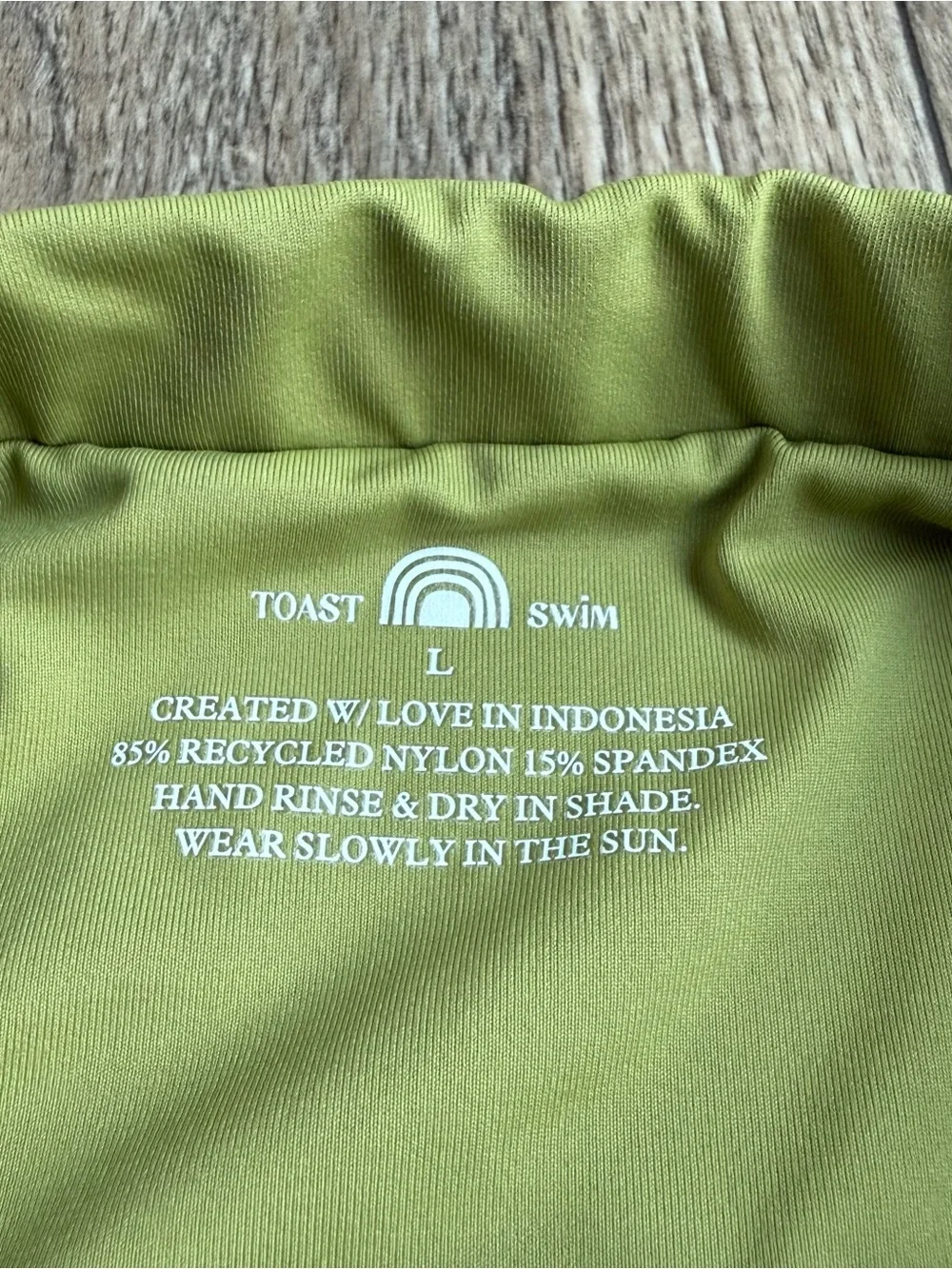 Free People x Toast signature tube one piece swimsuit size large light green